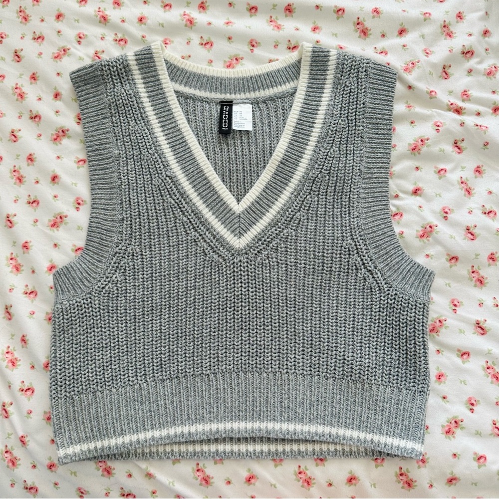 divided sweater vest